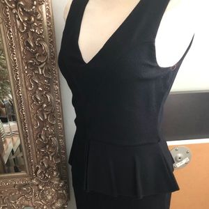 SOLD!! Imported black Crepe LBD with peplum, back zip